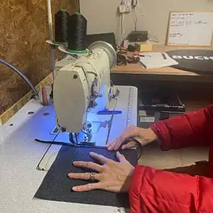 Wheelcovers made in our workshops. Making the soft vinyl skirts for the wheel covers.